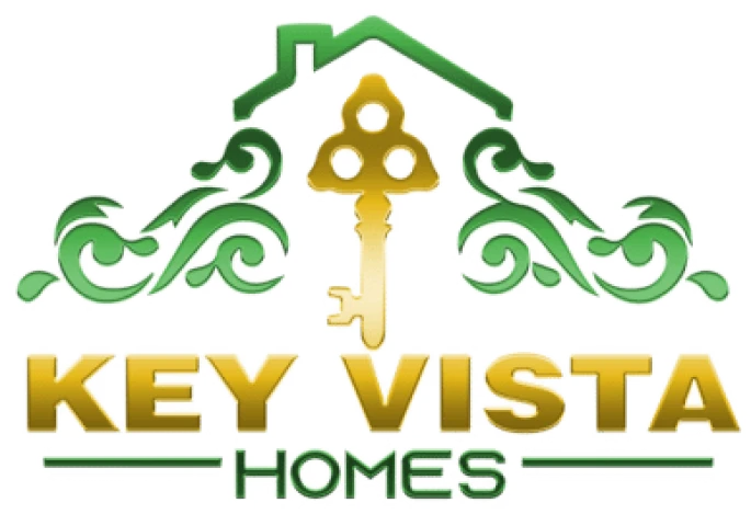 A decorative logo for Key Vista Homes featuring a stylized golden key and green ornamental design.