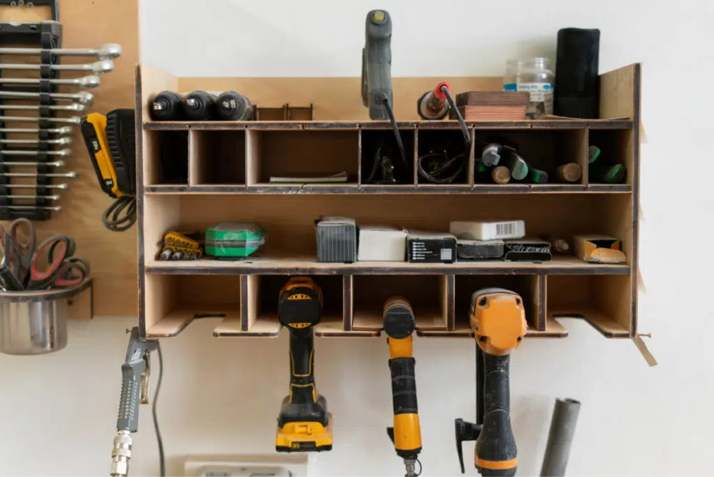 A wall-mounted tool organizer in a home workshop, highlighting the trend of personalized DIY spaces.